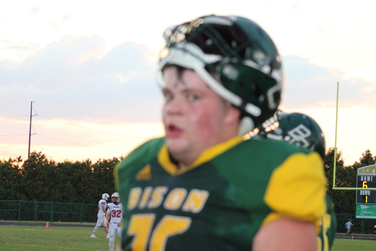 Jackson Bunch stares the camera down from the sidelines. 