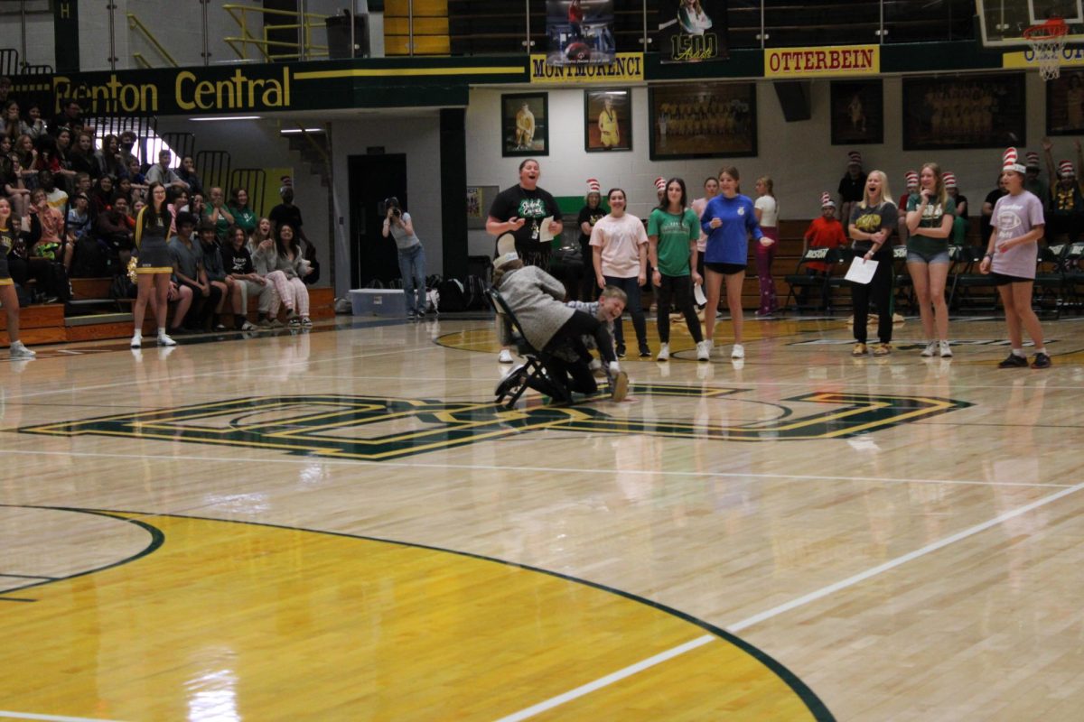 Two finalists competing for the last chair in Musical Chairs.