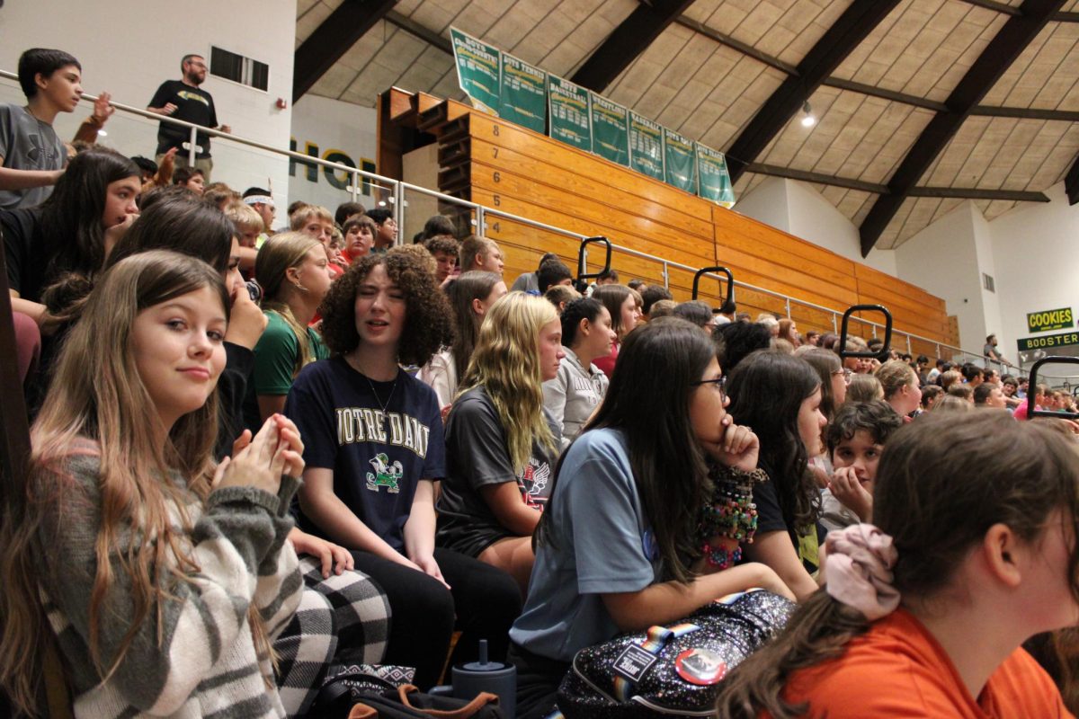 A crowd of energetic students waiting for the Pep Session to begin.