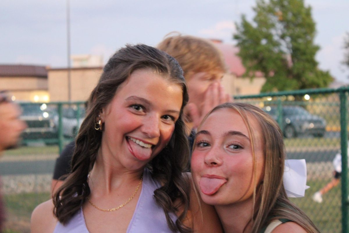 Juniors Ella Creek and Attalia Budreau take a playful pose. 