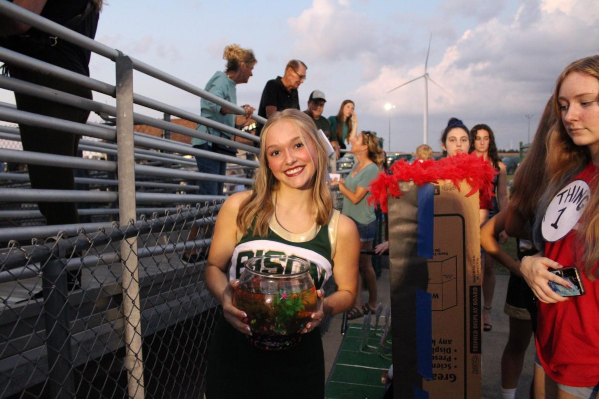 Junior Anna Hagen poses with Junior Class Fish, Krinklebine. 