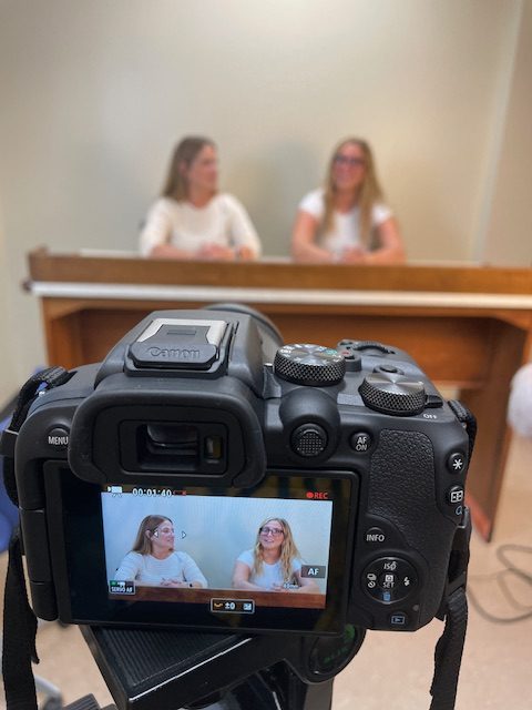 Mrs. Minier and her daughter, Olivia, model the new studio set up.