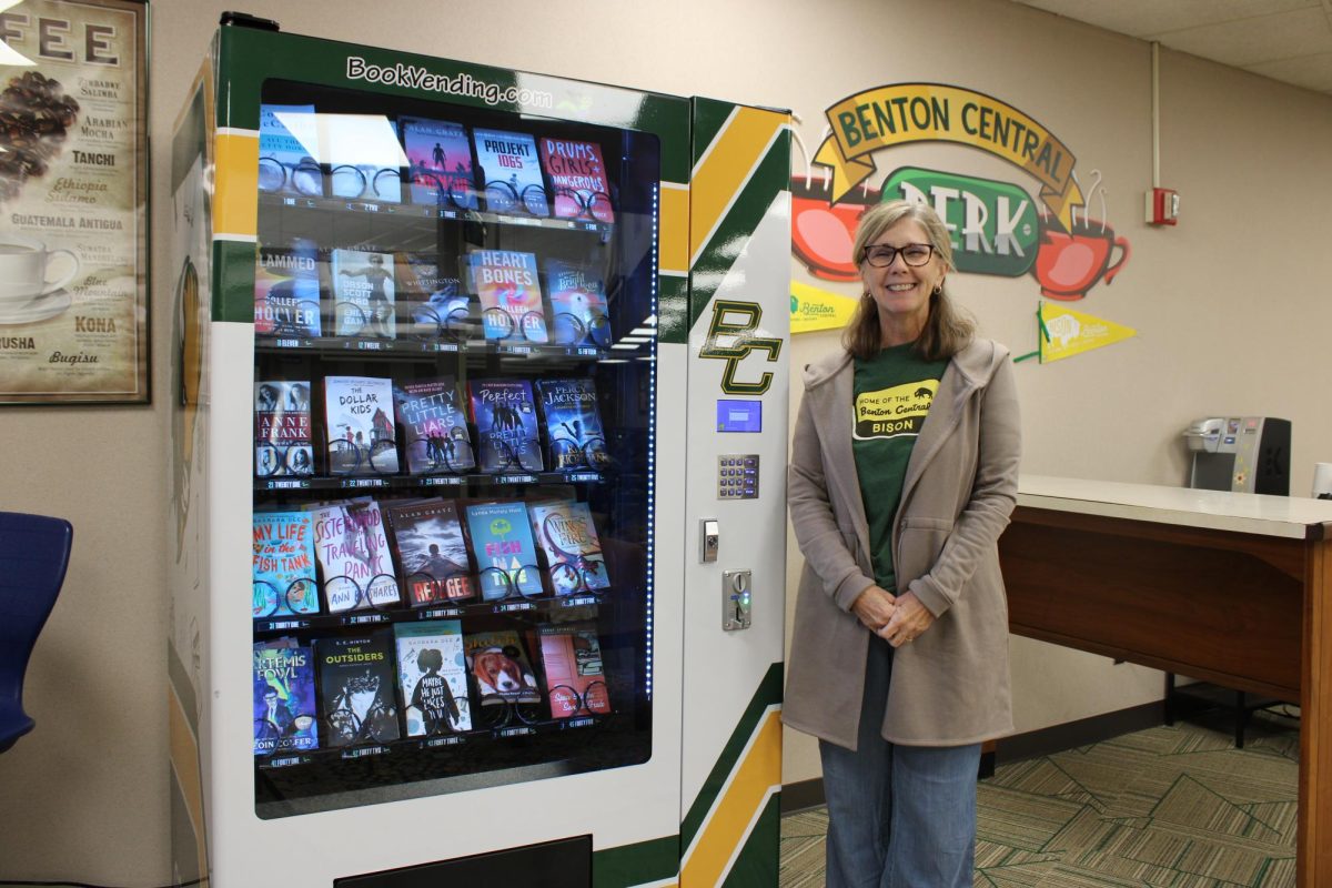 Edie Fisher, the school's instructional coach, showing off the machine in question.