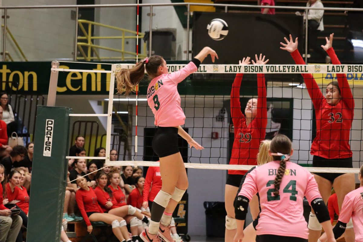 Calista Foster hitting the ball