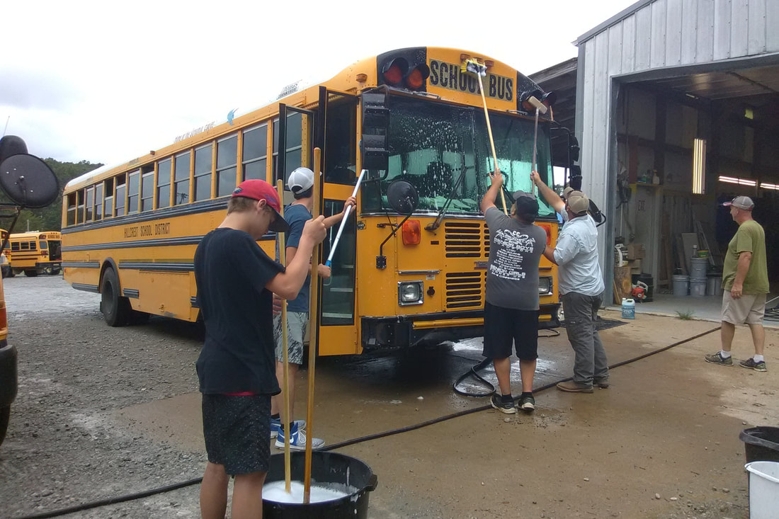 Wash Buses this summer at Benton Central